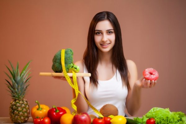 cute-woman-with-fresh-vegetables-fruits-leading-healthy-lifestyle_118454-10368